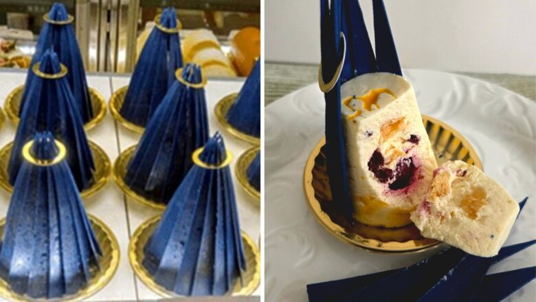 氷川の杜yakumoのラピスラズリ。ショーケースに並ぶ瑠璃色の三角錐と、ドライフルーツたっぷりのレアチーズケーキの断面